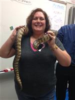 Picture of Mrs. Mettler holding a snake.